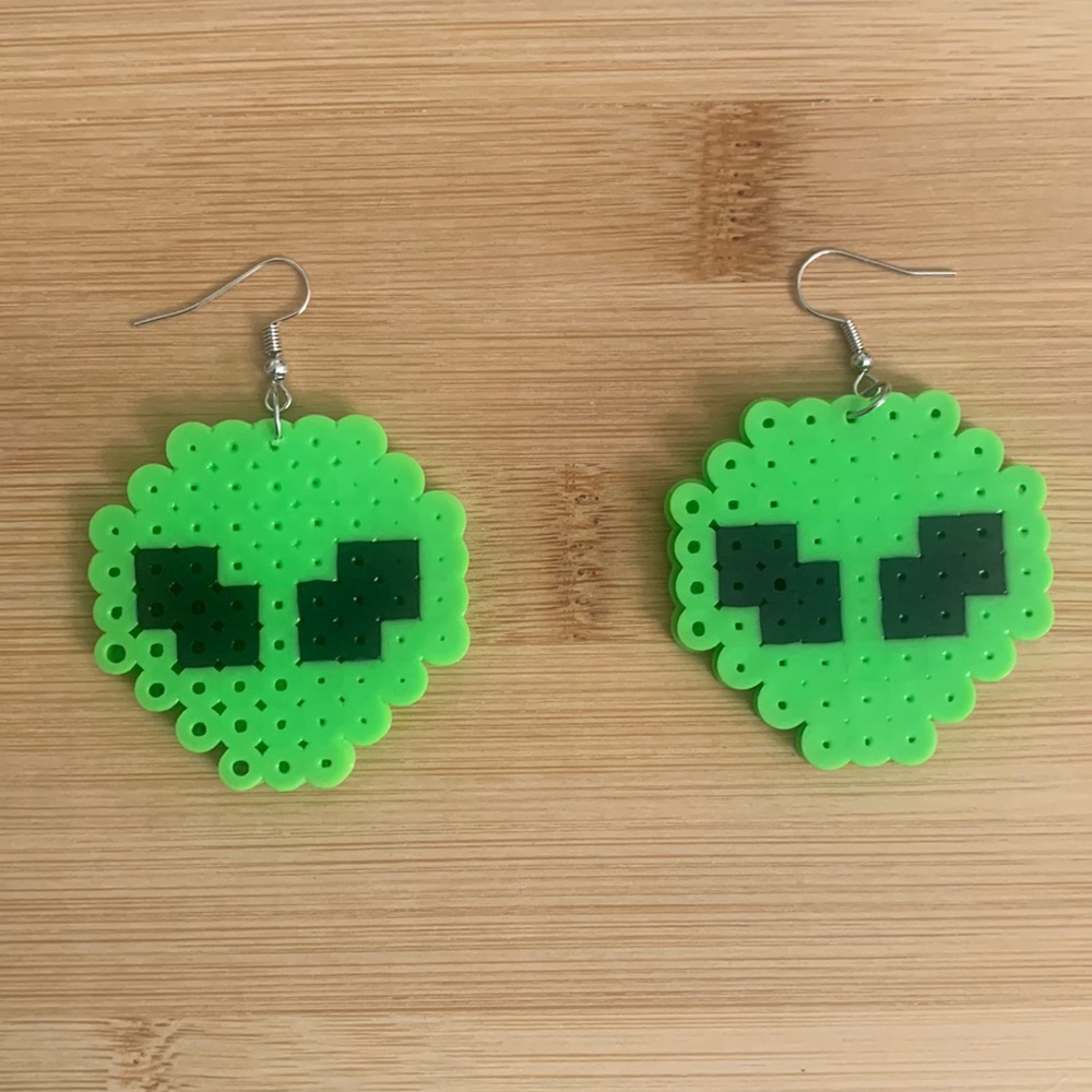 Handmade alien earrings.
